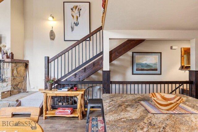 75 Rose Hip Cir, Big Sky, MT 59716 - dining area featuring wood finished floors and stairs