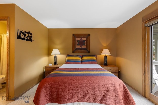75 Rose Hip Cir, Big Sky, MT 59716 - bedroom with light carpet and access to outside