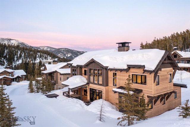 453 Outlook Trl, Big Sky, MT 59716 - snow covered property with a mountain view