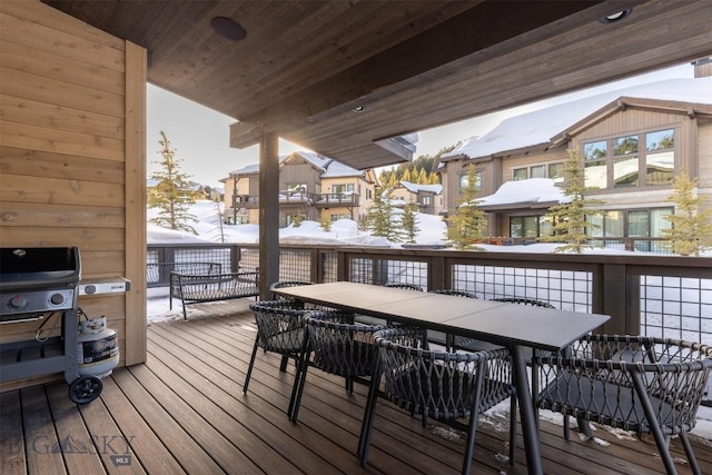 453 Outlook Trl, Big Sky, MT 59716 - snow covered deck with outdoor dining space and area for grilling