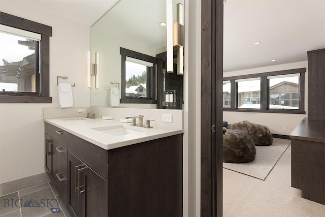 453 Outlook Trl, Big Sky, MT 59716 - bathroom featuring double vanity, baseboards, and recessed lighting