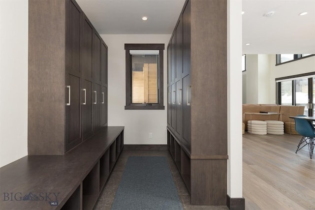 453 Outlook Trl, Big Sky, MT 59716 - mudroom with wood finished floors and recessed lighting
