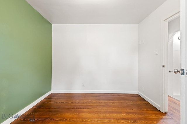 209 N 3rd, Bozeman, MT 59715 - unfurnished room featuring wood finished floors and baseboards
