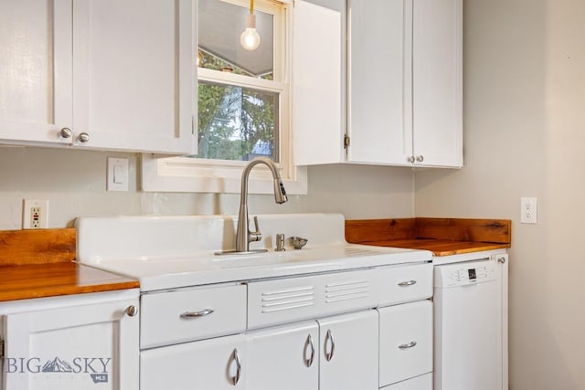 209 N 3rd, Bozeman, MT 59715 - kitchen with white dishwasher, white cabinetry, and light countertops