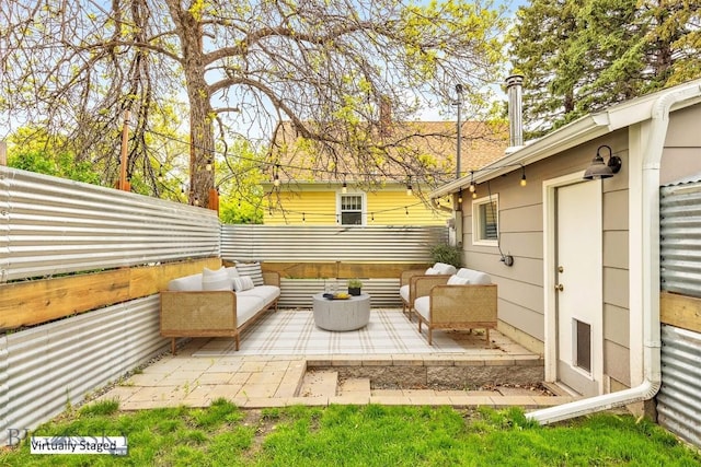 209 N 3rd, Bozeman, MT 59715 - fenced backyard with a patio area and outdoor lounge area