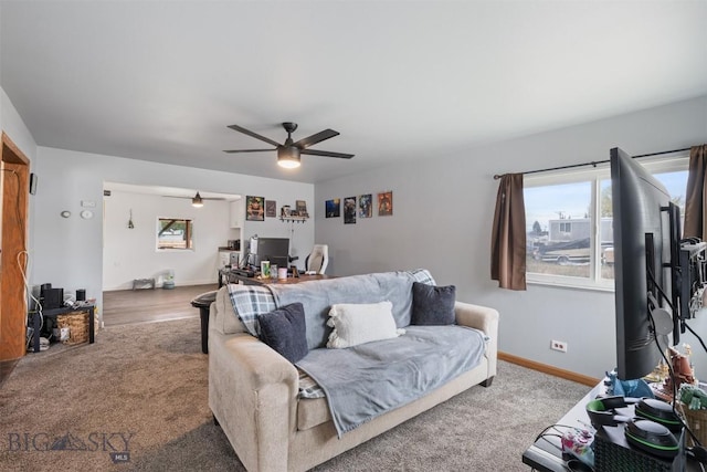 2422 Pine St, Butte, MT 59701 - living area with ceiling fan, carpet flooring, and baseboards