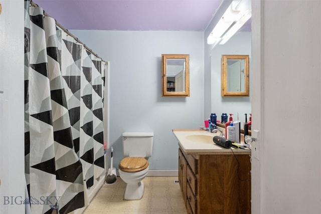 2422 Pine St, Butte, MT 59701 - full bath with tile patterned floors, vanity, toilet, and curtained shower