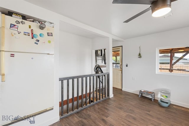 2422 Pine St, Butte, MT 59701 - spare room with wood finished floors, plenty of natural light, and baseboards