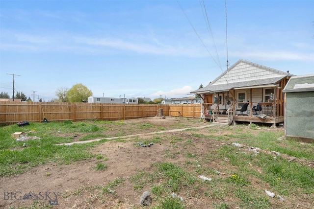 2422 Pine St, Butte, MT 59701 - fenced backyard featuring covered porch
