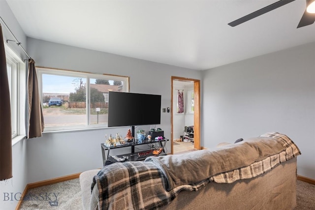 2422 Pine St, Butte, MT 59701 - living room featuring carpet floors, baseboards, and a ceiling fan