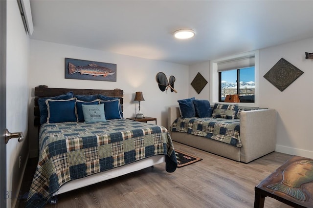 198 E River Rd, Emigrant, MT 59027 - bedroom featuring wood finished floors and baseboards