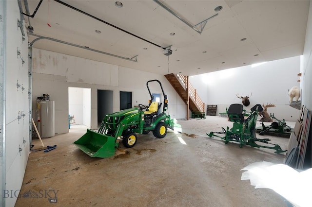 198 E River Rd, Emigrant, MT 59027 - garage featuring gas water heater and a garage door opener