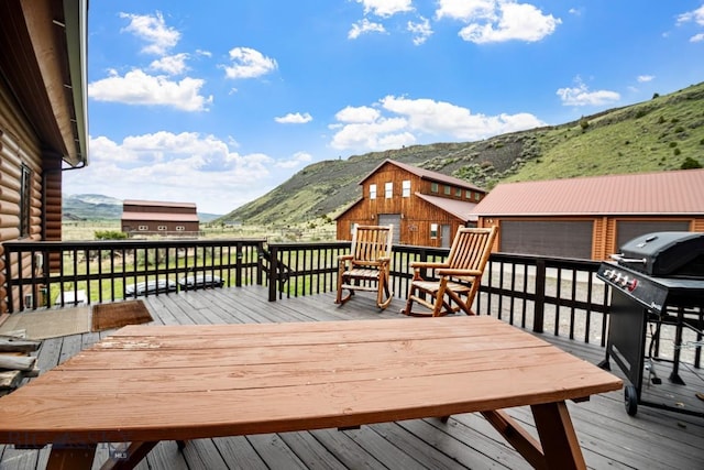198 E River Rd, Emigrant, MT 59027 - wooden terrace featuring a mountain view and grilling area