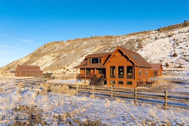198 E River Rd, Emigrant, MT 59027 - rear view of house with a mountain view