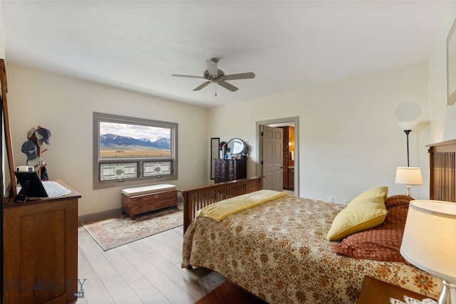 106 Lonesome Dove Rd, Cameron, MT 59720 - bedroom featuring light wood finished floors and ceiling fan