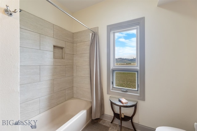 106 Lonesome Dove Rd, Cameron, MT 59720 - full bath featuring shower / tub combo, toilet, and baseboards