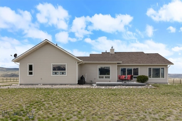 106 Lonesome Dove Rd, Cameron, MT 59720 - back of property featuring a chimney, a patio area, and central AC unit