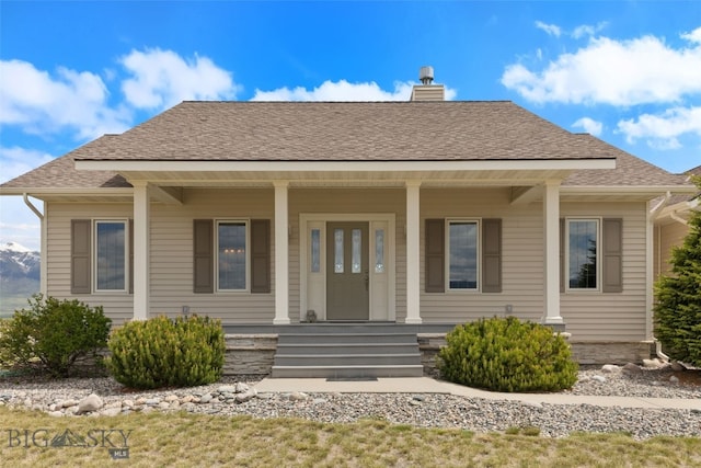 106 Lonesome Dove Rd, Cameron, MT 59720 - bungalow-style house featuring covered porch, a chimney, and a shingled roof