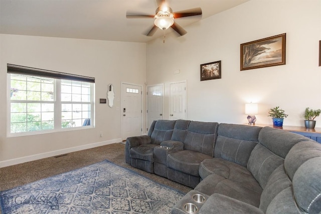 2008 Avocet Ct, Belgrade, MT 59714 - carpeted living room featuring baseboards, ceiling fan, and high vaulted ceiling