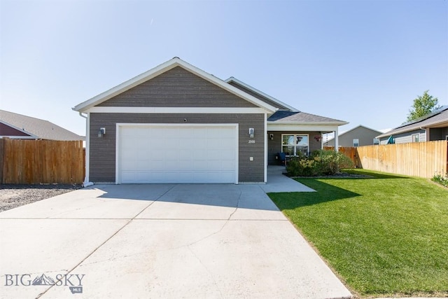 2008 Avocet Ct, Belgrade, MT 59714 - ranch-style house with concrete driveway and an attached garage