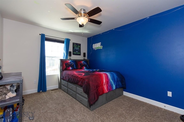 2008 Avocet Ct, Belgrade, MT 59714 - bedroom with carpet flooring, baseboards, and ceiling fan