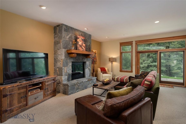 250 Petes Way, Big Sky, MT 59730 - carpeted living room featuring a fireplace and recessed lighting