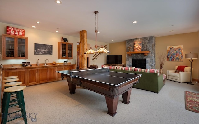 250 Petes Way, Big Sky, MT 59730 - rec room with light colored carpet, recessed lighting, and a fireplace