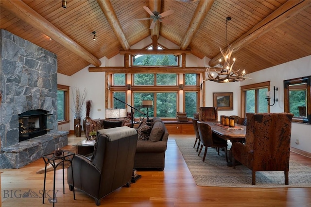 250 Petes Way, Big Sky, MT 59730 - living area with wood ceiling with exposed beams, a chandelier, wood finished floors, ceiling fan, and high vaulted ceiling