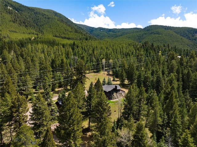 250 Petes Way, Big Sky, MT 59730 - view from above of property with a heavily wooded area and mountains