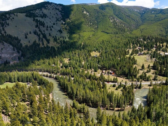 250 Petes Way, Big Sky, MT 59730 - view of mountain backdrop with a forest