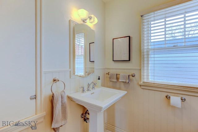 923 W Clark St, Livingston, MT 59047 - bathroom with wainscoting and plenty of natural light