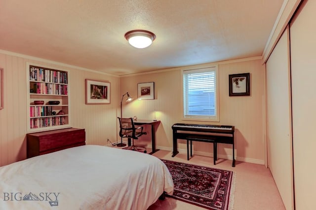 923 W Clark St, Livingston, MT 59047 - carpeted bedroom with ornamental molding and baseboards