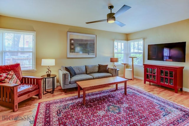 923 W Clark St, Livingston, MT 59047 - living room featuring wood finished floors, ceiling fan, and baseboards