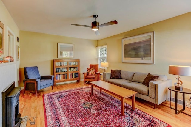 923 W Clark St, Livingston, MT 59047 - living area with light wood finished floors and a ceiling fan