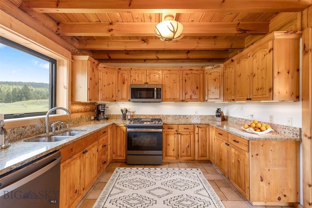 1266 Ousel Falls Rd, Big Sky, MT 59716 - kitchen with appliances with stainless steel finishes, a sink, wooden ceiling with exposed beams, light stone countertops, and light tile patterned floors