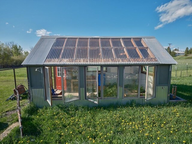2178 Little Bear Rd, Gallatin Gateway, MT 59730 - rear view of property featuring metal roof and an outbuilding