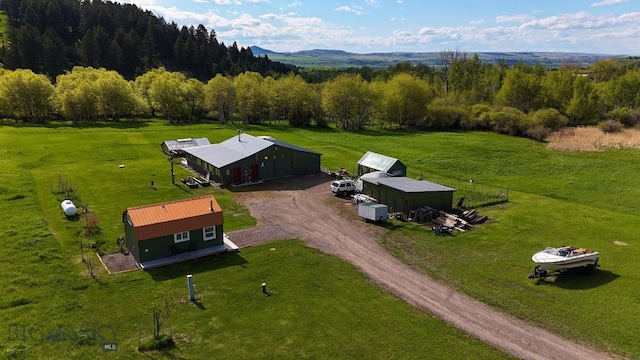 2178 Little Bear Rd, Gallatin Gateway, MT 59730 - view of subject property with a mountainous background and a heavily wooded area