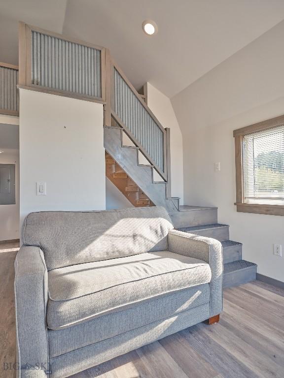 2178 Little Bear Rd, Gallatin Gateway, MT 59730 - living room featuring stairway, electric panel, wood finished floors, baseboards, and recessed lighting