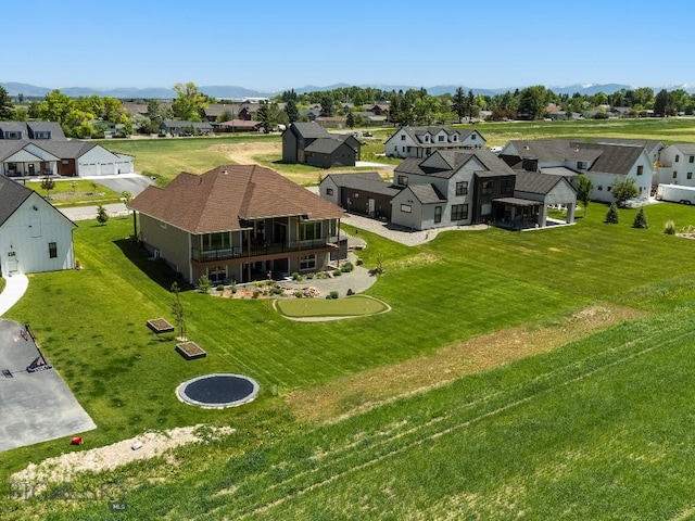 145 Cushing Ln, Manhattan, MT 59741 - aerial perspective of suburban area with a mountainous background