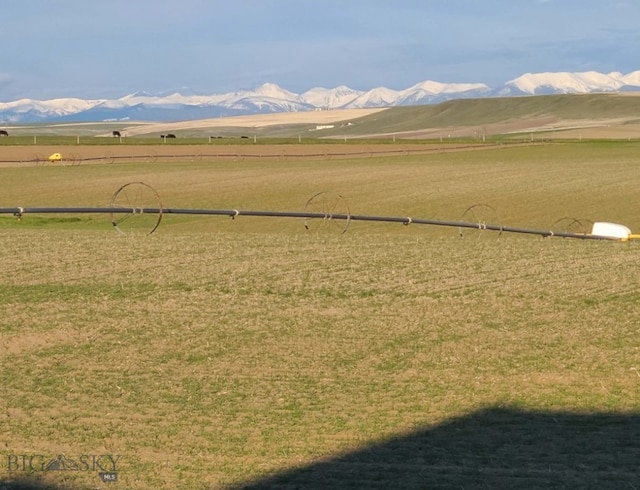 145 Cushing Ln, Manhattan, MT 59741 - view of green lawn featuring a rural view and a mountain view