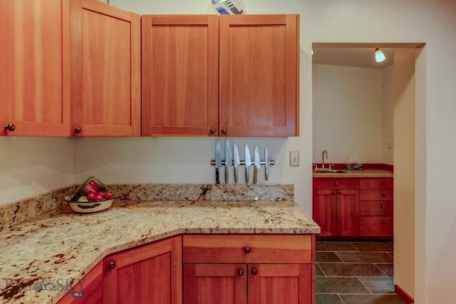 425 N 7th St, Livingston, MT 59047 - kitchen featuring a sink and light stone counters