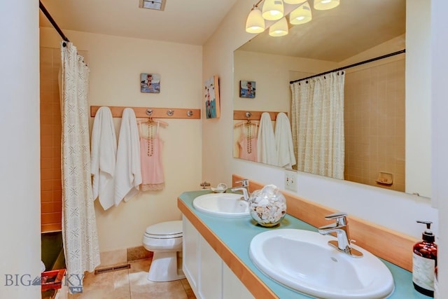 425 N 7th St, Livingston, MT 59047 - full bathroom with toilet, double vanity, a shower with curtain, and tile patterned flooring
