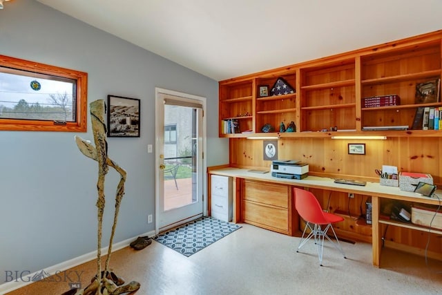 425 N 7th St, Livingston, MT 59047 - office space with built in desk, vaulted ceiling, and baseboards