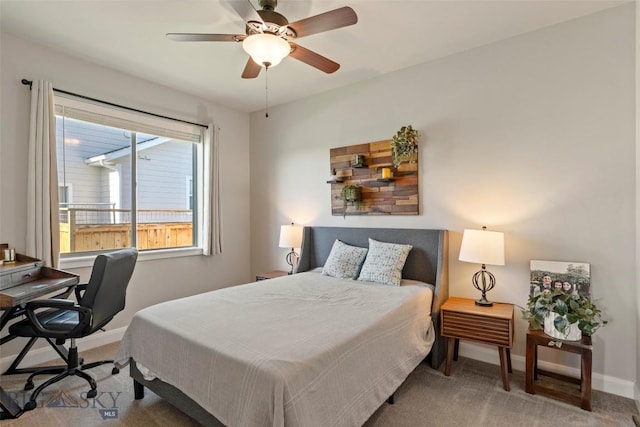 1711 Shelby Ave, Belgrade, MT 59714 - bedroom featuring carpet flooring, baseboards, ceiling fan, and a desk