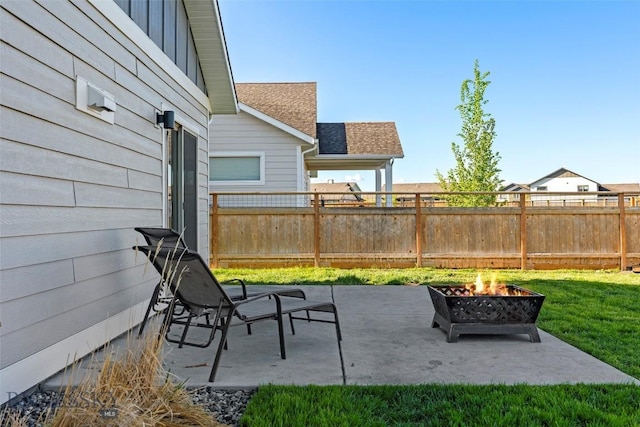 1711 Shelby Ave, Belgrade, MT 59714 - view of patio / terrace featuring an outdoor fire pit