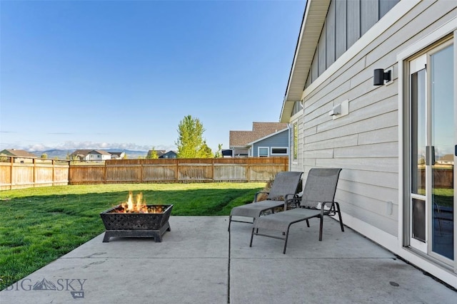 1711 Shelby Ave, Belgrade, MT 59714 - view of patio / terrace featuring a fire pit