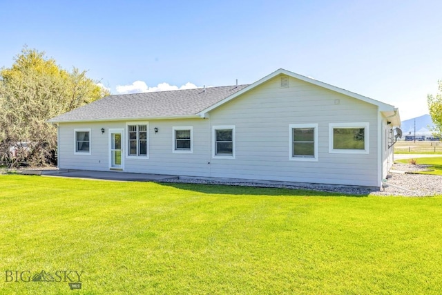 41 Madison, Ennis, MT 59729 - back of house featuring a yard and a patio