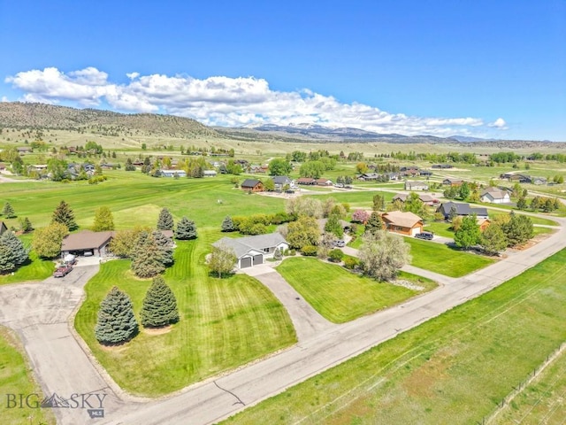 41 Madison, Ennis, MT 59729 - aerial perspective of suburban area featuring a mountain backdrop