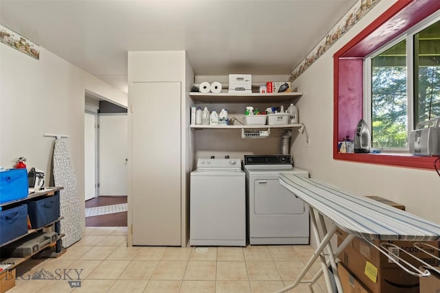 707 Montana St, Belgrade, MT 59714 - washroom with separate washer and dryer and light tile patterned floors