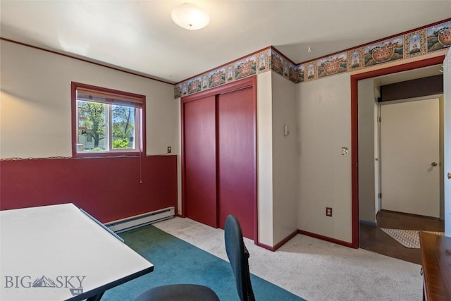 707 Montana St, Belgrade, MT 59714 - unfurnished office featuring a baseboard heating unit, carpet flooring, and baseboards